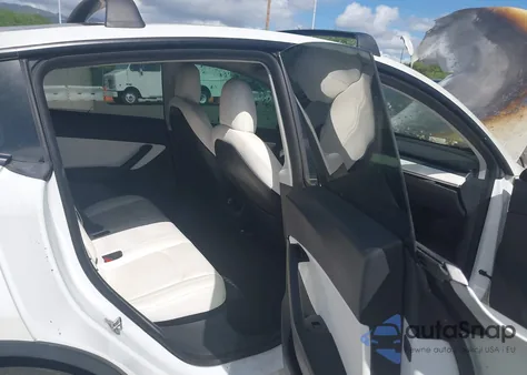 2021 Tesla Model Y Standard Range Rear-Wheel Drive from USA, damaged, VIN 5YJYGDEDXMF103483